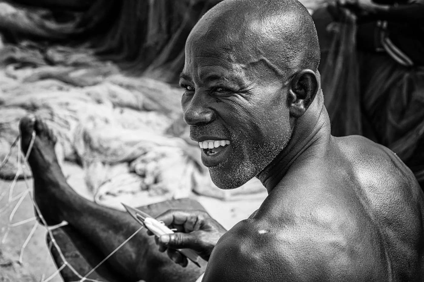 2019 Joao Miguel Barros A Fisherman Repairing His Fishing Net